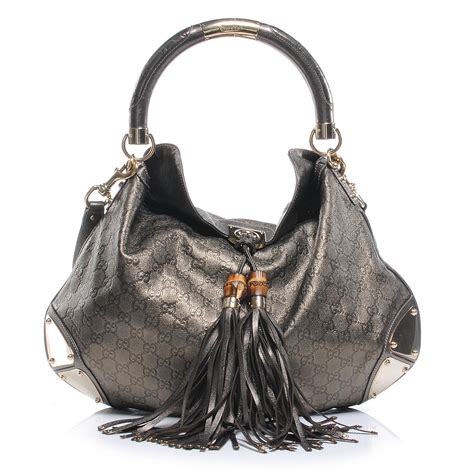 gucci hobo bag with tassels.